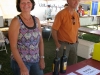Mickie Ryan and her husband Kyle spend their Saturday working at the Fee Run Cellars booth at the New Buffalo Harvest and Wine Fest
