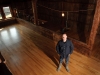 Gene Sigel stands in the 1885 barn that he restored to serve as a micro-distillery and tasting room.